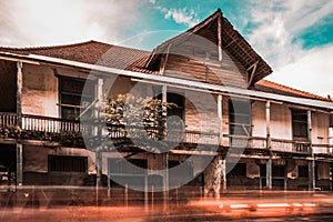 Heritage building in Indonesia, motion blur of car.