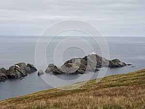 Hermaness National Nature Reserve. View on Muckle Flugga Lighthouse and Out Stack. Unst. Shetland Islands. Scotland