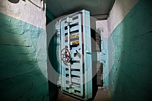 Hermetic door of an abandoned Soviet bomb shelter, an echo of the Cold War