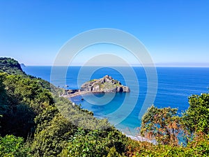 Hermitage of San Juan de Gaztelugatxe at the top of the island of Gaztelugatxe. Vizcaya, Basque Country Spain. Top view