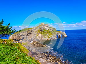 Hermitage of San Juan de Gaztelugatxe at the top of the island of Gaztelugatxe. Vizcaya, Basque Country Spain. Top view