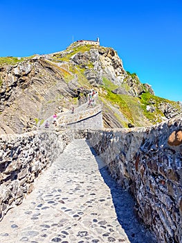 Hermitage of San Juan de Gaztelugatxe at the top of the island of Gaztelugatxe. Vizcaya, Basque Country Spain. View of the