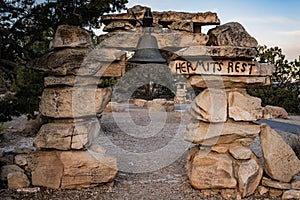 Hermits Rest Sign and Bell On Stacked Stone Arch