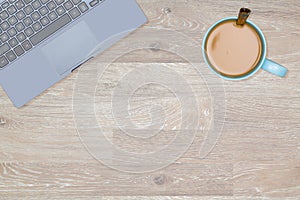 Hero Header image of tidy desktop with mug of coffee