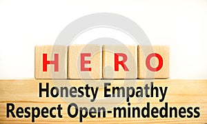 HERO honesty empathy respect oneness symbol. Concept words HERO honesty empathy respect oneness on blocks on beautiful white