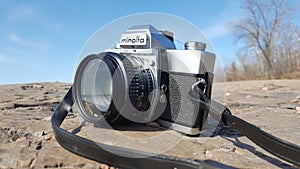 Minolta SRT 102 with 50mm f1.7 Rokkor Lens on Rocks