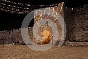 Herod Gate or Flowers Gate at night, one of the gates to the Old City of Jerusalem, Israel. Bab az-Zahra