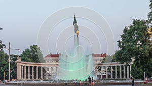 The heroes monument of the red army in schwarzenbergplatz day to night timelapse at night with colorful light fountain