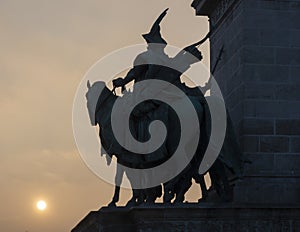 Heroes Square in Budapest with the images as a silhouette at sunset