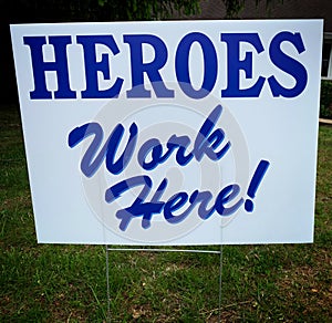 Heroes work here sign