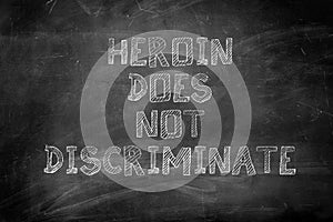 Heroin does not discriminate message on chalk board photo