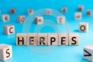 Herpes - word from wooden blocks with letters