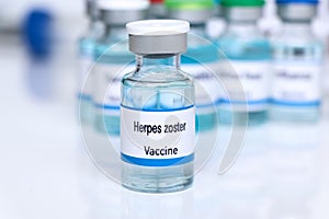 Herpes zoster vaccine in a vial, immunization and treatment of infection