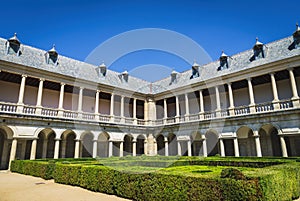 Herrerian style cloister and part of the gardens of the Monastery of San Lorenzo de el Escorial. photo