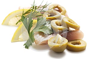 Herring with lemon and olive