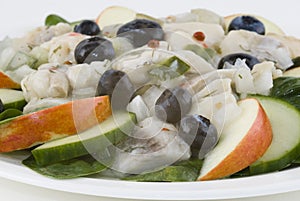 Herring, onion, blueberry salad