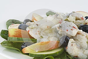 Herring, onion, blueberry salad