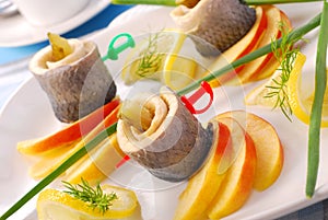 Herring rolls with apple