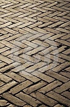 Herringbone pattern of block pavement.