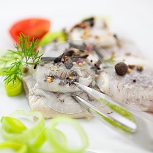 Herrings with aromatic spices photo