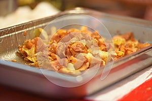 Making potato chips at a christmas market in Austria