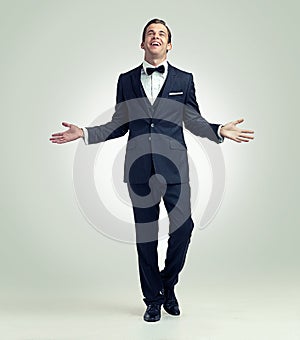 Hes arrived. A full length studio portrait of a young man posing confidently while wearing a vintage suit.
