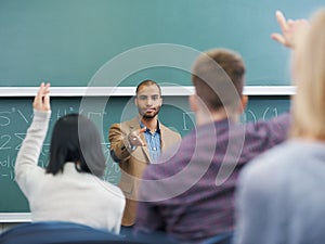 Hes dedicated to his students. Cropped shot of a lecturer addressing his students.