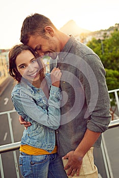 Hes so good to me. a happy young couple enjoying a romantic moment in the city.