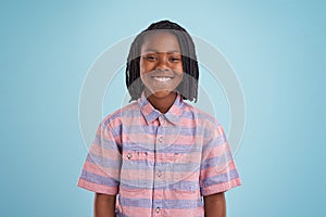 Hes got confidence. A portrait of a happy young boy standing in studio.
