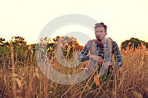 Hes got a love for the outdoors. a handsome young man enjoying the view while hiking.