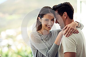 Hes just perfect for me. Portrait of a happy young couple in a loving embrace.