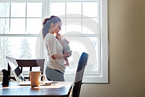 Hes the love of her life. a mother holding her newborn baby.