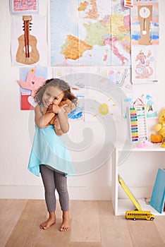 Hes my best friend. Portrait of an adorable little girl holding her teddybear.