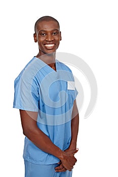 Hes a renowned surgeon. Studio shot of a young doctor in blue scrubs.