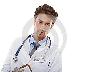 Hes serious about your wellbeing. Studio shot of a serious-looking young medical professional holding a clipboard.