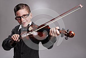 Hes a virtuoso. Studio shot of a young musician dressed in a suit.