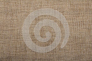 Hessian sackcloth burlap woven texture background / cotton woven fabric background with flecks of varying colors of beige and brow