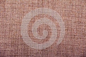 Hessian sackcloth burlap woven texture background / cotton woven fabric background with flecks of varying colors of beige and brow