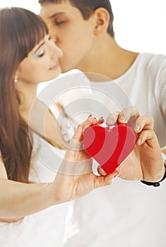 Heterosexual couple with a heart photo