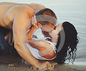 Heterosexual couple man and woman kissing hot