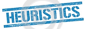 HEURISTICS text on blue grungy rectangle stamp