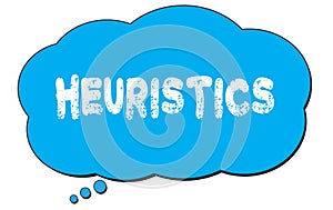 HEURISTICS text written on a blue thought bubble photo