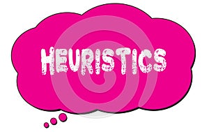 HEURISTICS text written on a pink thought bubble photo