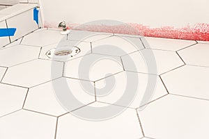 Hexagon floor tile installation