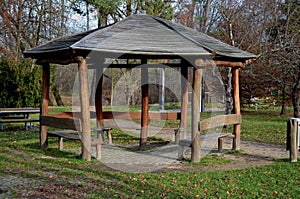 hexagonal gazebo for antique-style spa bands on a pedestal of a circular photo