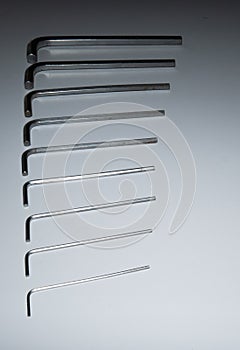 Hexagonal key on a white background. Copy space