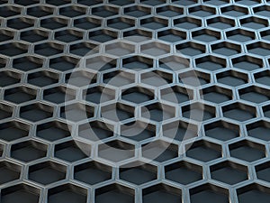 Hexagonal metal cells on a gray background. Abstract background with geometric structure. Texture with honeycombs. 3d rendering