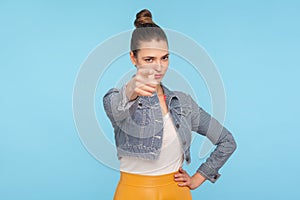 Hey, are you ready? Portrait of bossy strict lady with hair bun in fashionable clothes pointing finger to camera