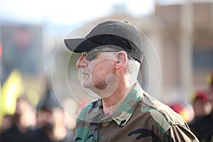 Hezbollah`s young man supporter Carries the flag of Hezbollah