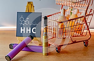 HHC distillate cartridge Vape Hexahydrocannabinol a psychoactive half synthetic cannabinoid and CBD oils photo